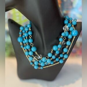 Glossy 3-layer Strand Turquoise-tone resin beads with gold-tone chain